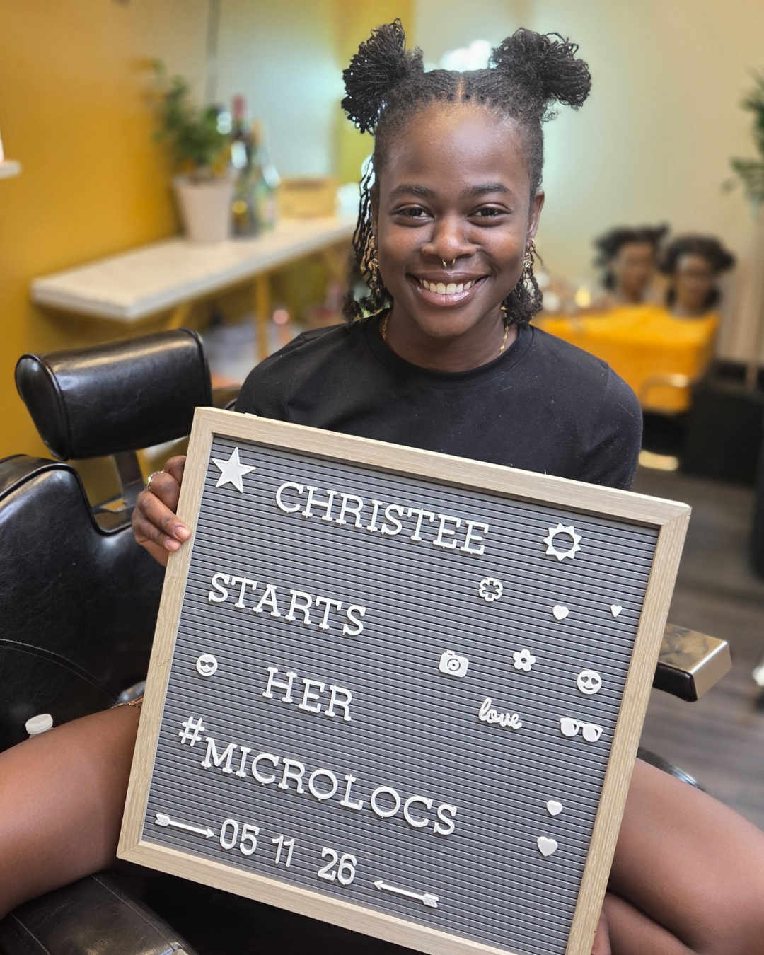 starter microlocs installation on natural hair by Shamate Reid Brown in Oakland, California