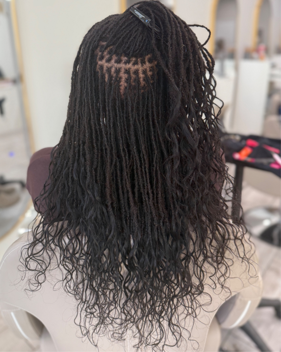 Microlocs extensions with curly ends by Myssberri's Salon in Brooklyn,  New York