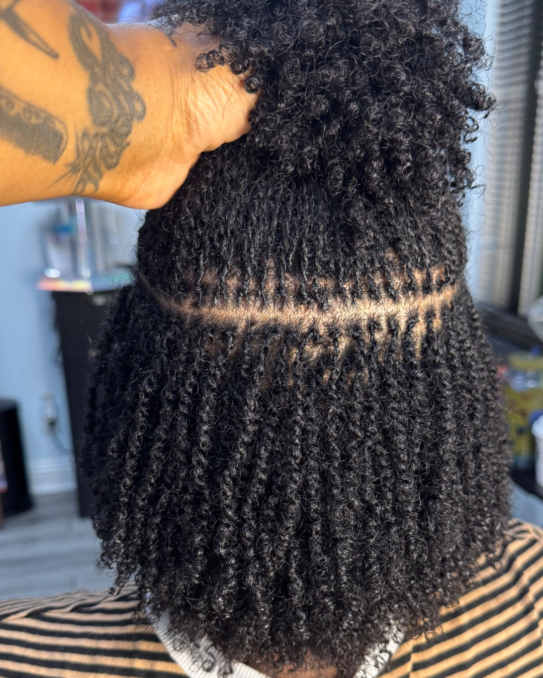 Fresh microlocs installation on natural hair by Nike Blount in Upland, California