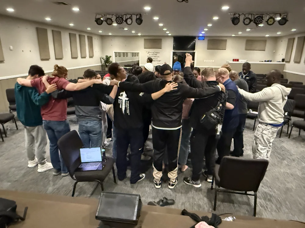 Men of Action gathered in prayer