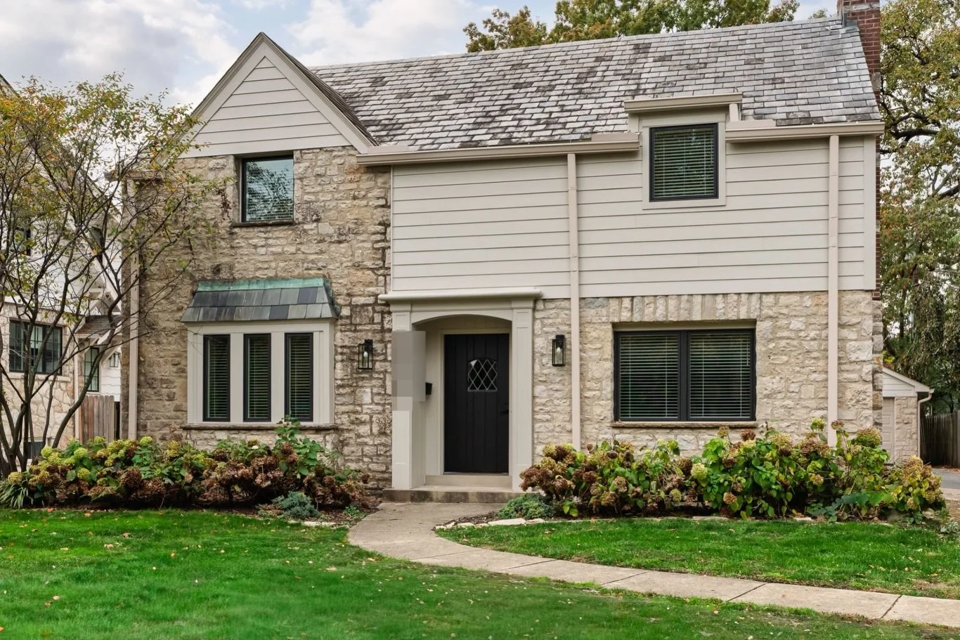 We mentioned in part 3 of our #SoLseries that we demoed the covered porch that was accessible from the front room turned office. 

The porch removal streamlined the exterior of the home and makes the home appear more prominent &mdash; probably also a