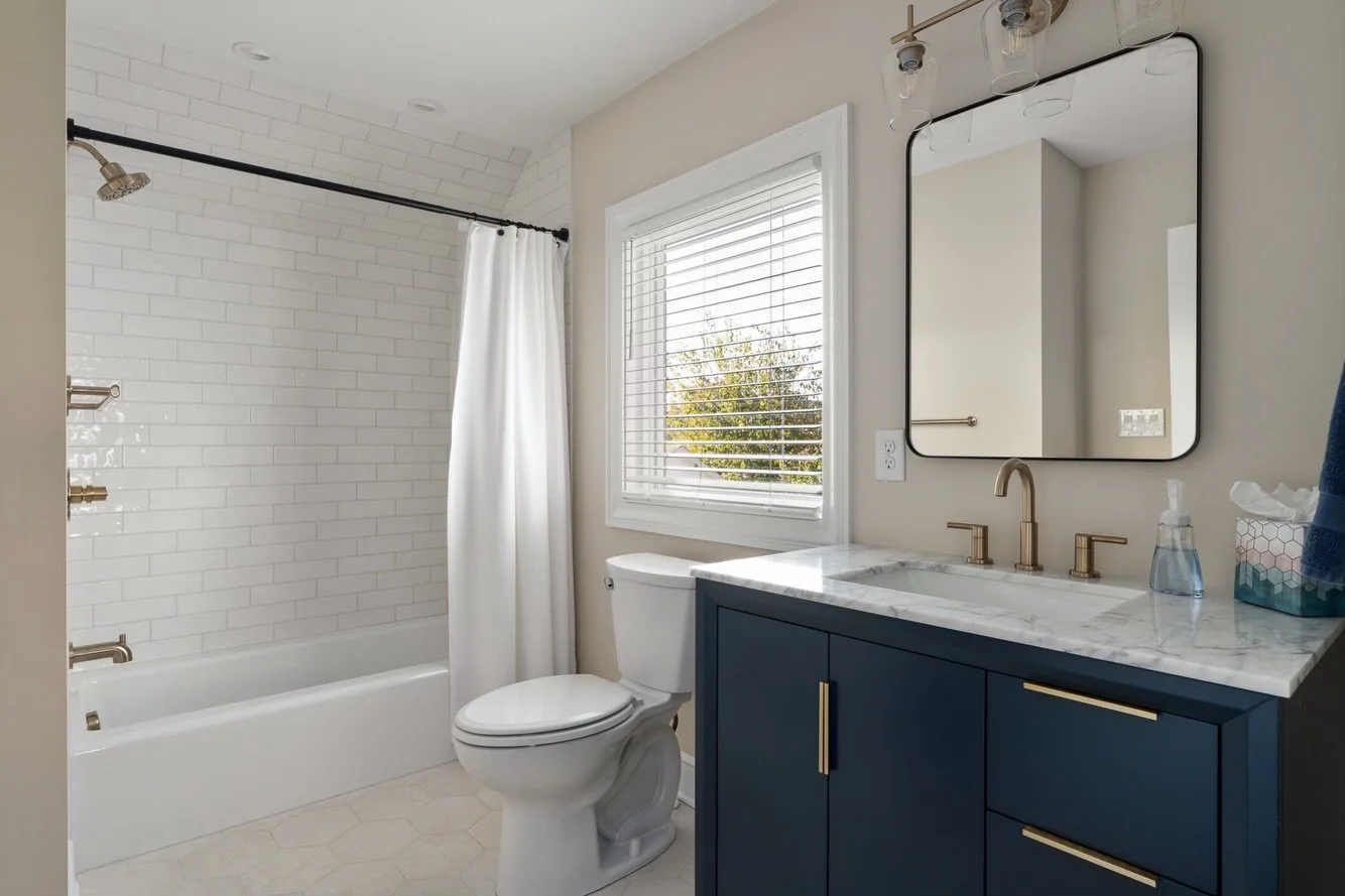 Upstairs in our #SoL remodel the former bedroom off the top of the staircase shifted into a beautiful guest bath. The footprint here decreased from the original to lend square footage to the primary bath on the other side of the wall (up next in this