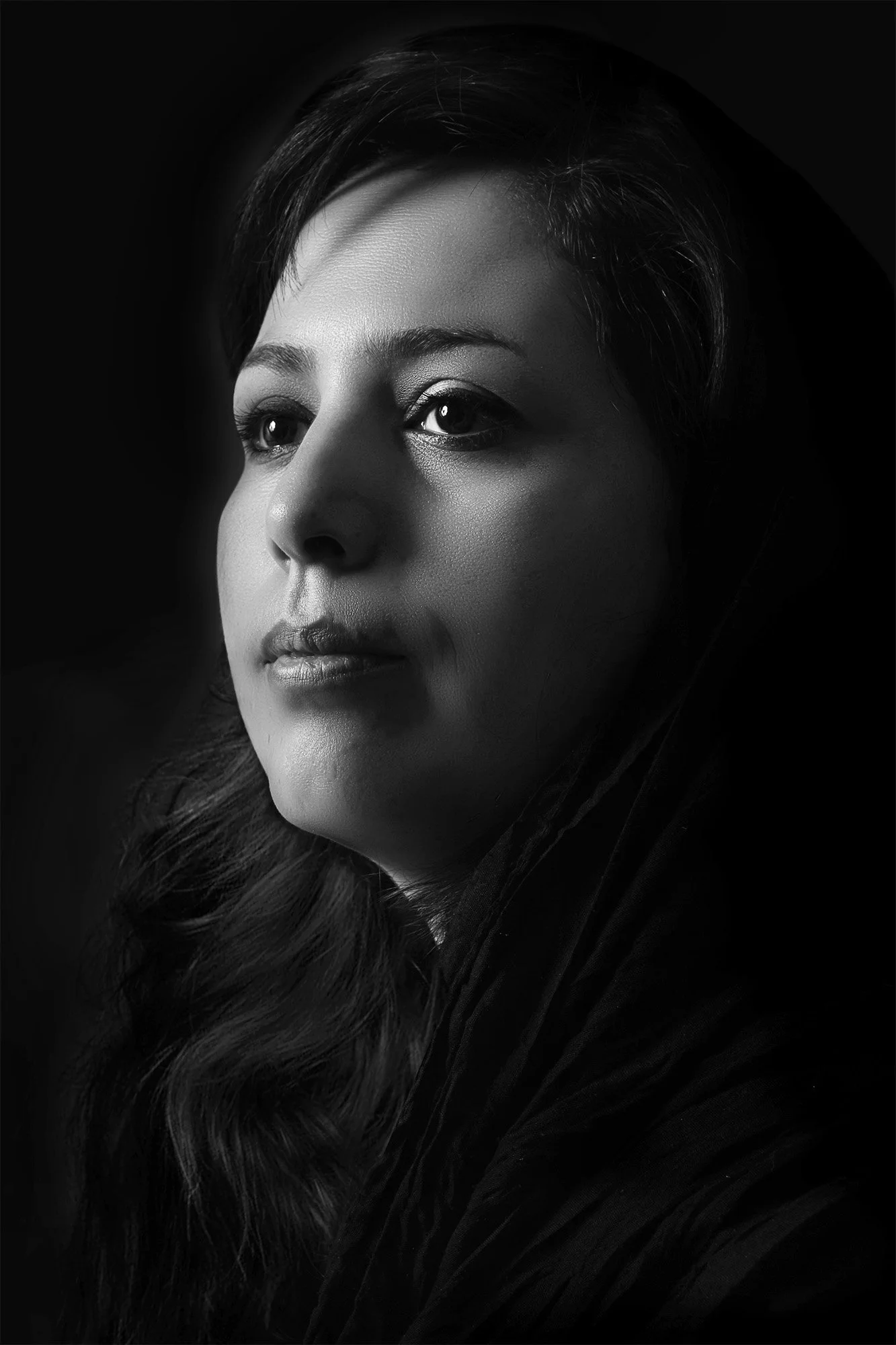 Black and white portrait of Nahid Naderi, abstract fine art photographer based in California.