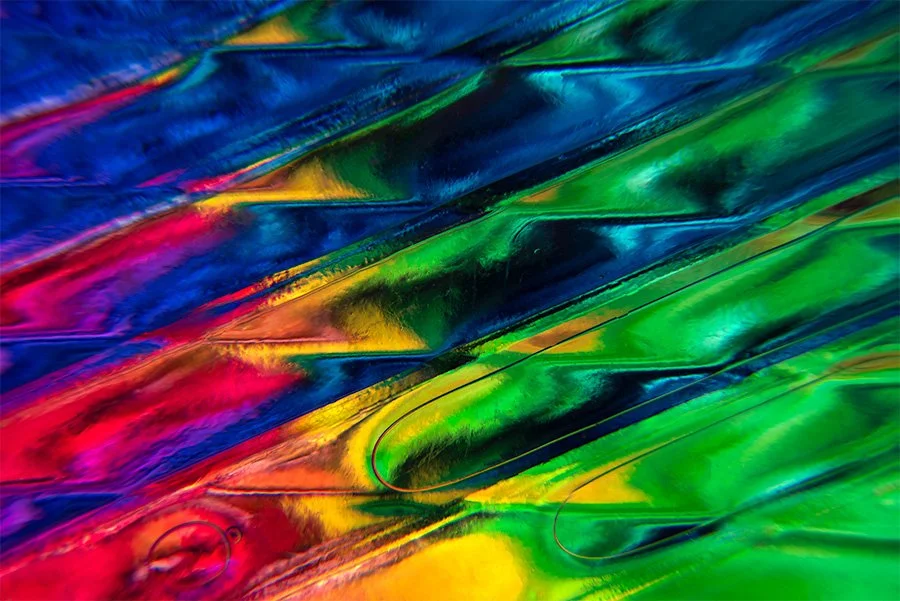 Abstract photograph with a luminous flow of colors, created with a 'my lens as palette' approach by Nahid Naderi.