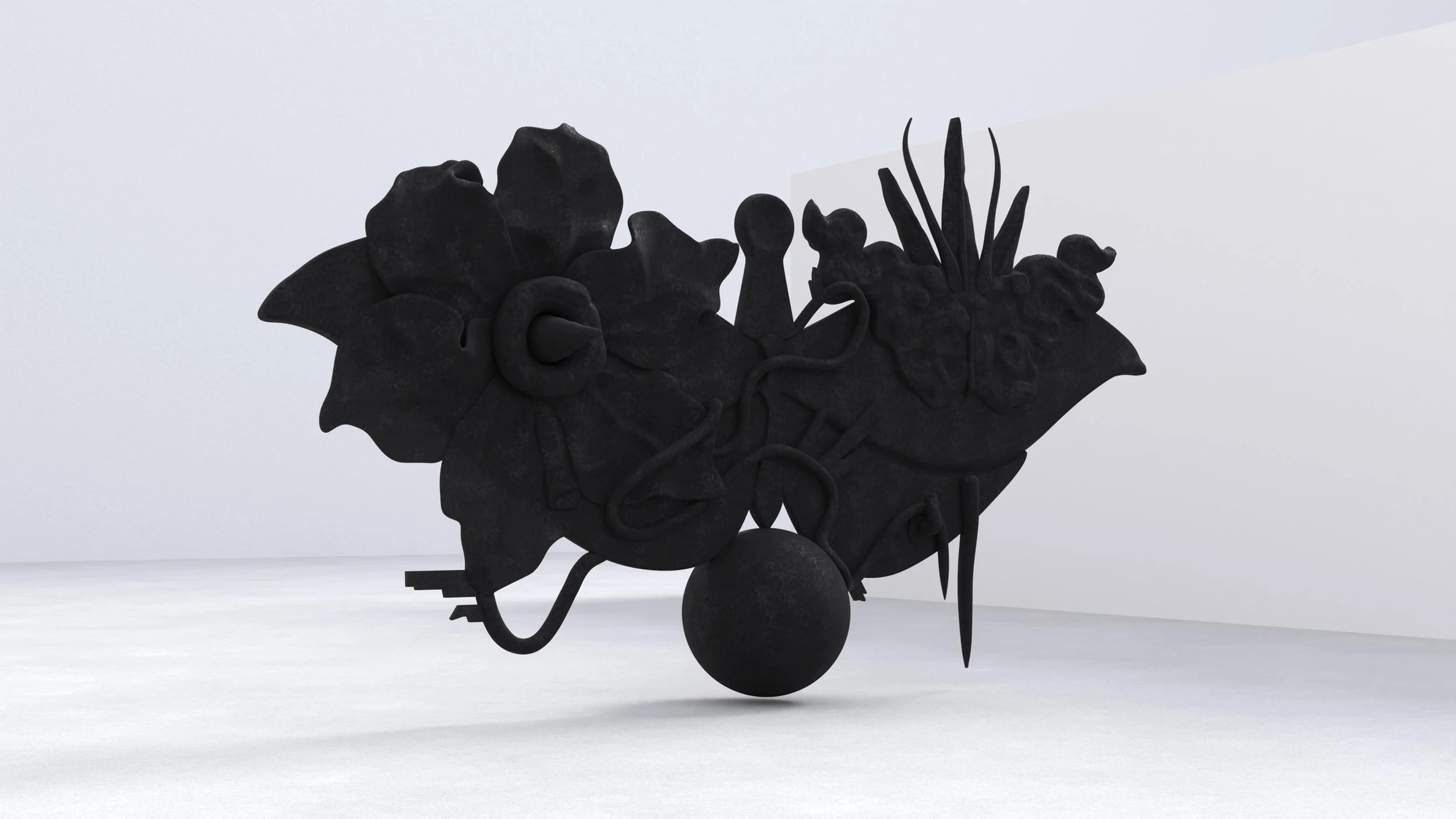 A black abstract sculpture resembling a creature with a large round head, small pointed limbs, and surrounded by various organic shapes, displayed against a plain white background.