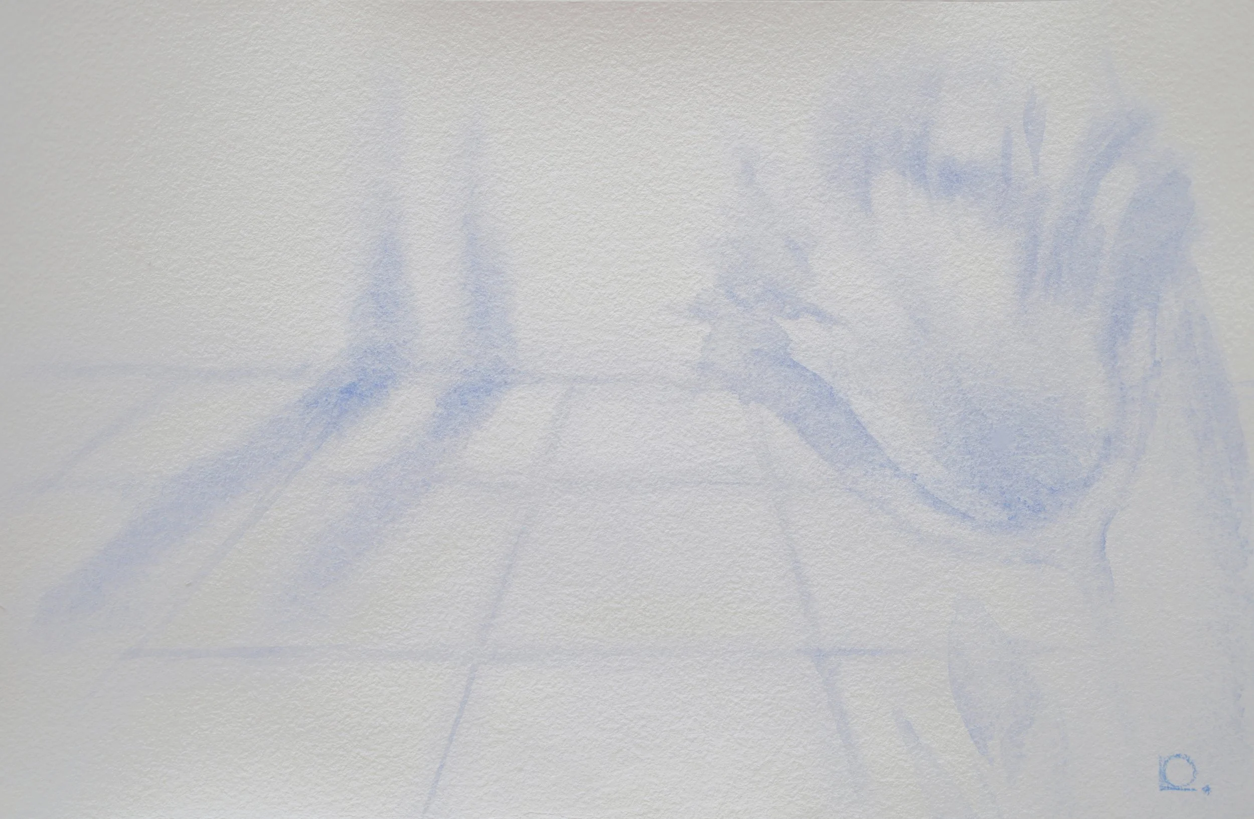 Faint blue ink stain or watercolor mark on white textured paper.