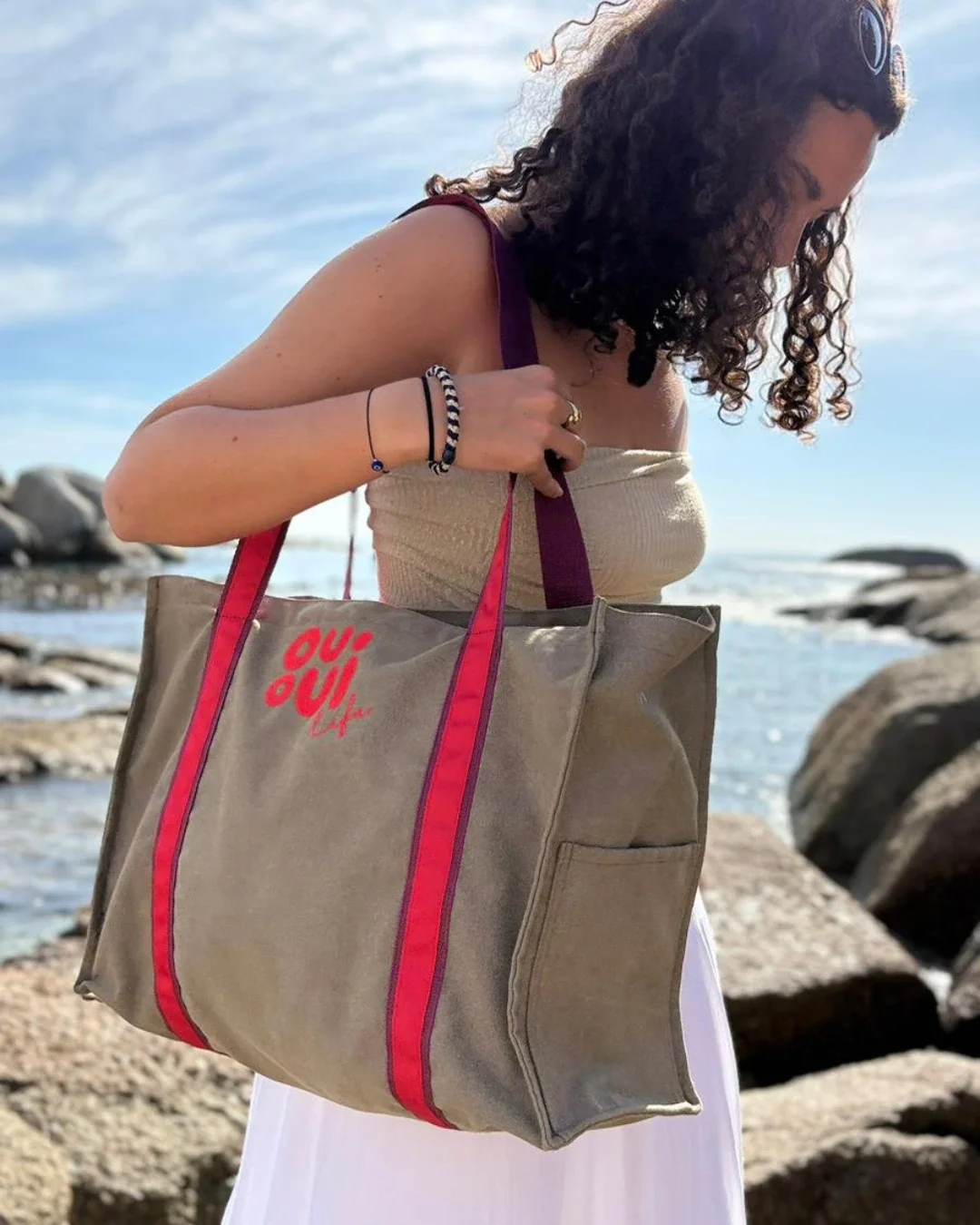 Handcrafted buckskin washed canvas tote bag with vintage striped handles and custom embroidery. Handmade by Soli in Cape Town for sustainable merchandise or corporate gifts.