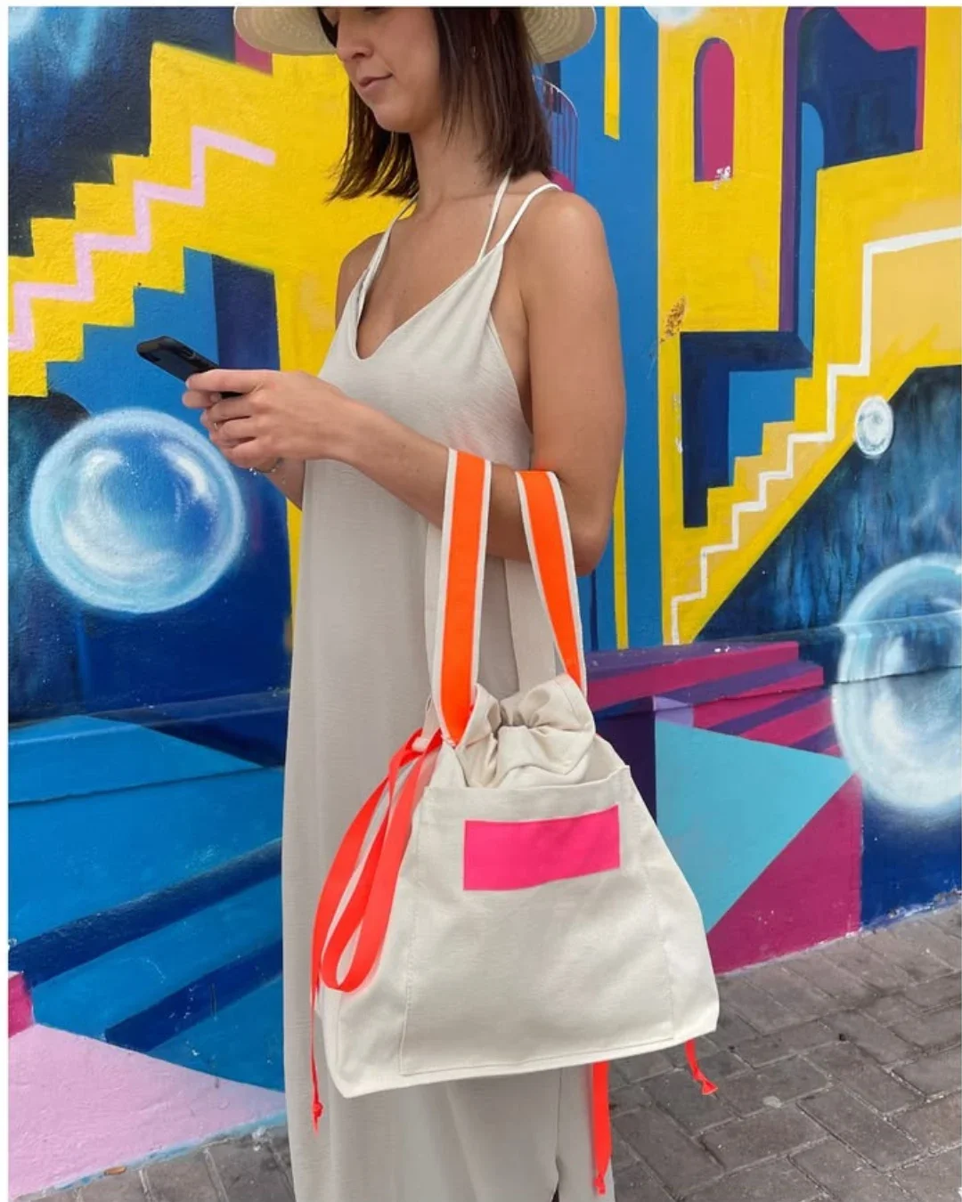Handmade Neon Cherry canvas bag with bright orange straps and pink pocket detail, crafted from 100% heavy cotton canvas in Cape Town.