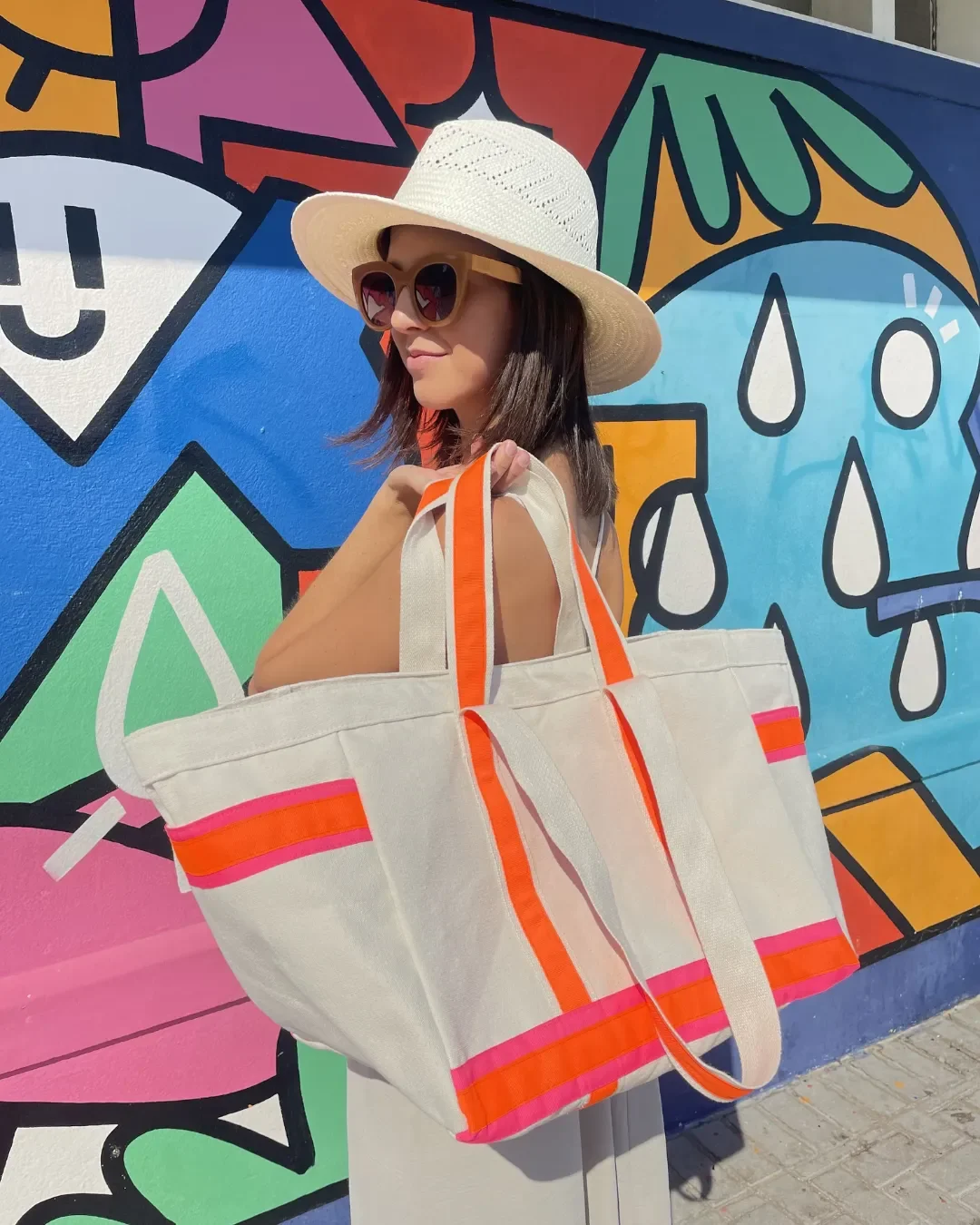 Large Neon Shopper bag handmade from thick 510gsm natural canvas with vibrant orange and pink neon straps, crafted by local artisans in Cape Town.