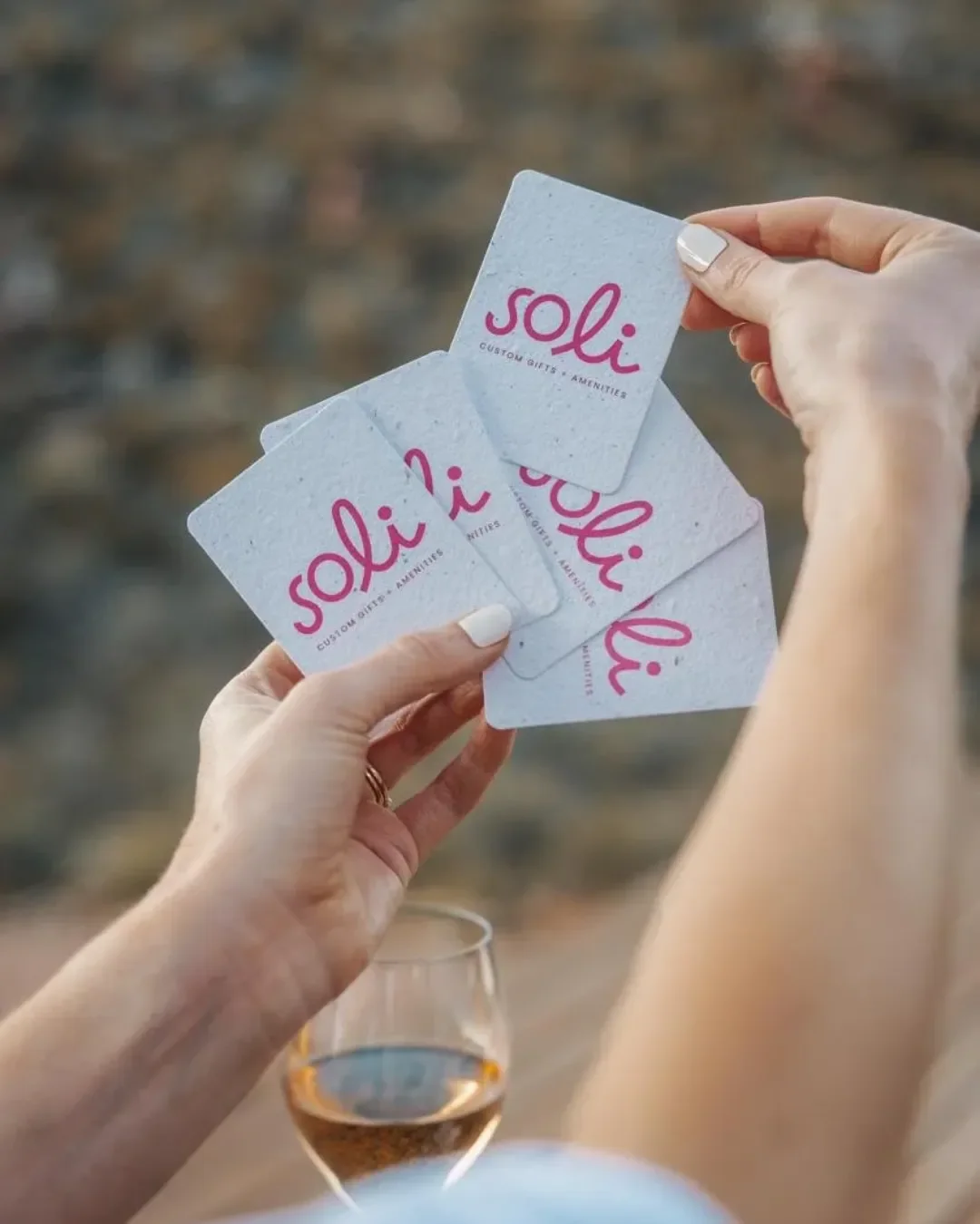 Custom-branded plantable playing cards corporate gift featuring a giraffe illustration and Soli branding, handmade in Cape Town from 100% recycled biodegradable seed paper.