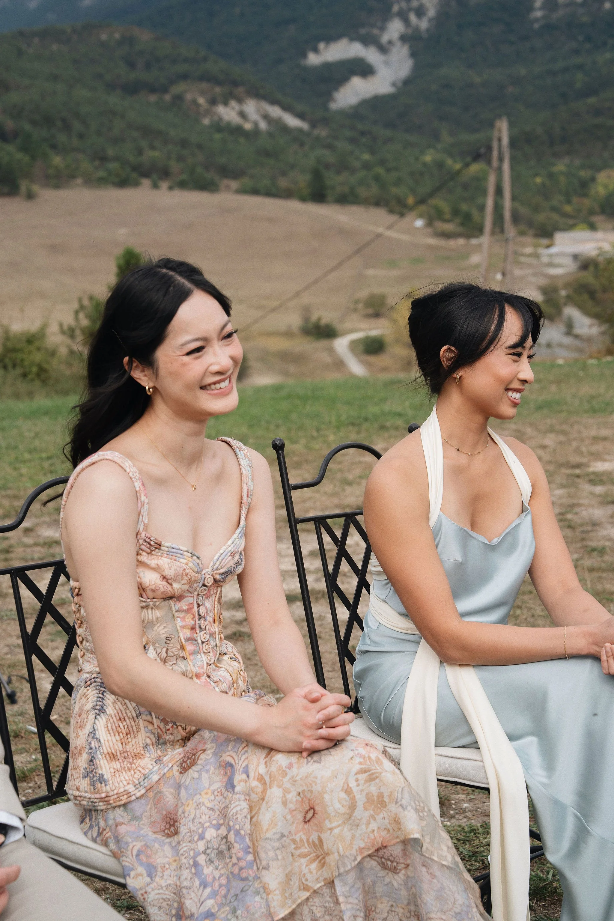 Smiling bridesmaids with natural makeup at an outdoor wedding in the Alps of Haute-Provence