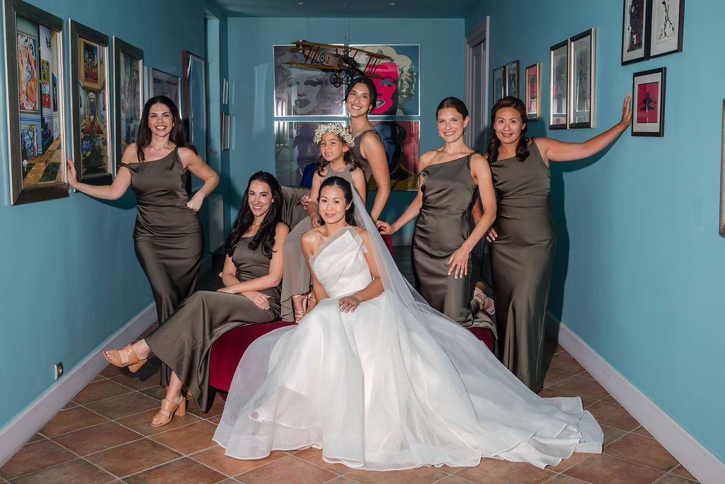 Bride with her bridesmaids in olive satin dresses, natural bridal party makeup for a destination wedding in Provence, France