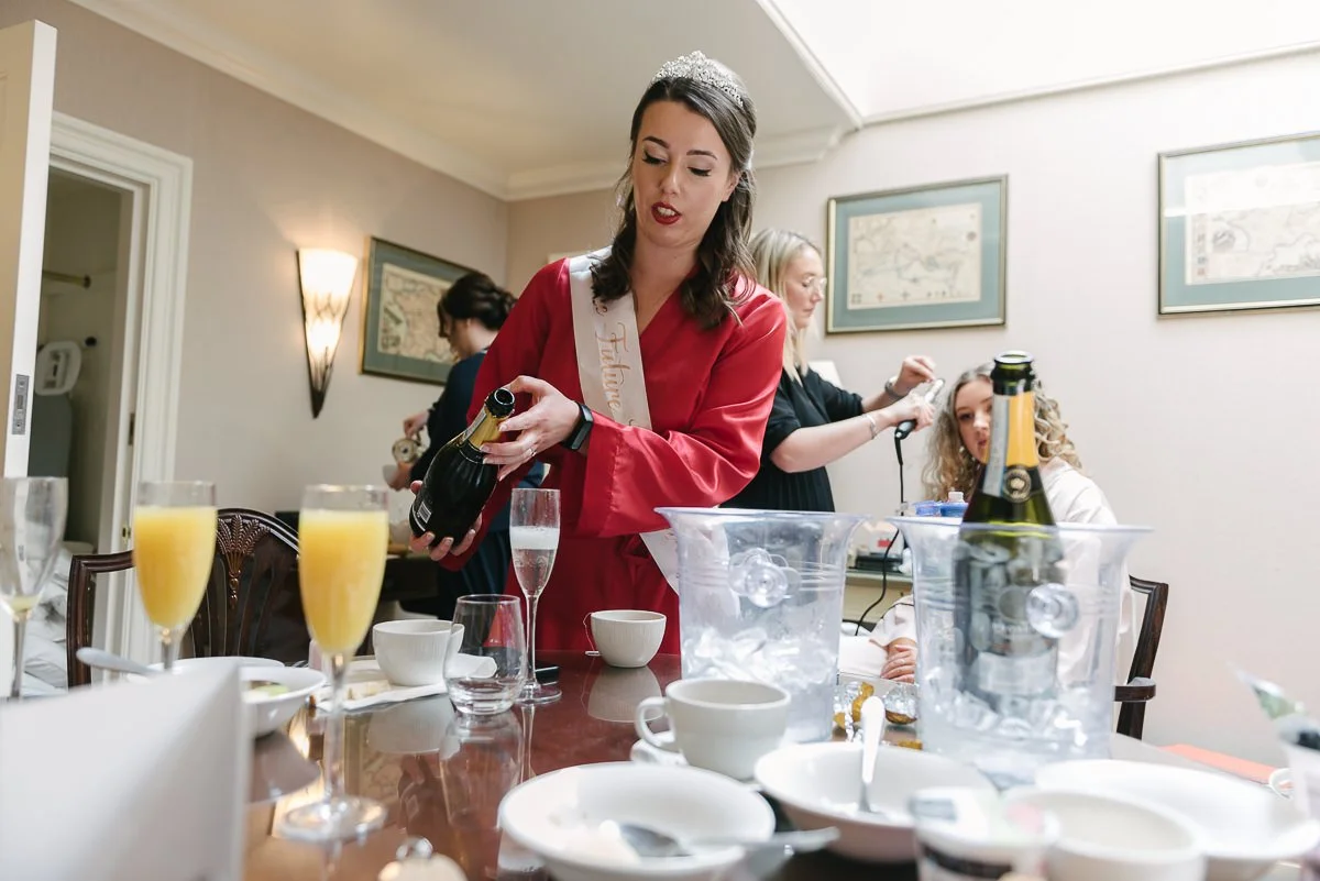 Ellie pouring the bucks fizz