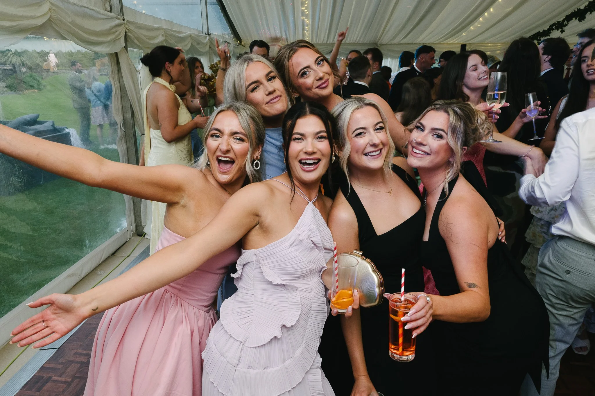 Gaggle of bridesmaids enjoying the party