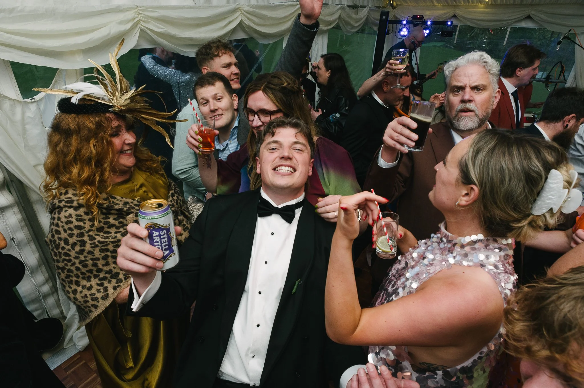 The groom celebrating on the dancefloor