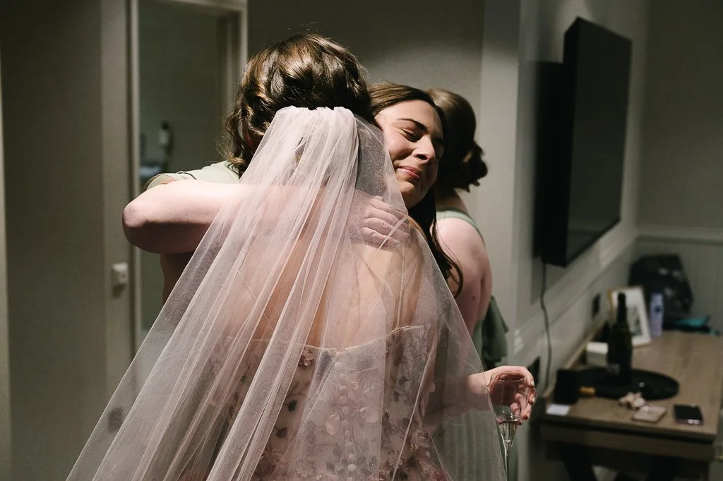 Hugging the bride sheffield wedding 