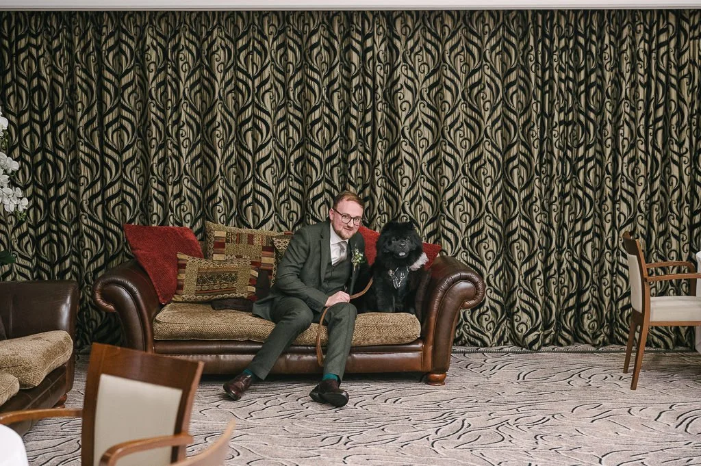 Groom with the dog by Mark Hillyer Skipton Wedding Photography