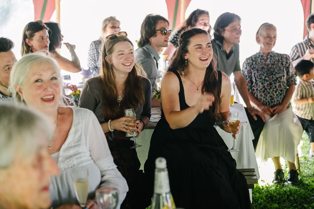 guests laughing at the speeches