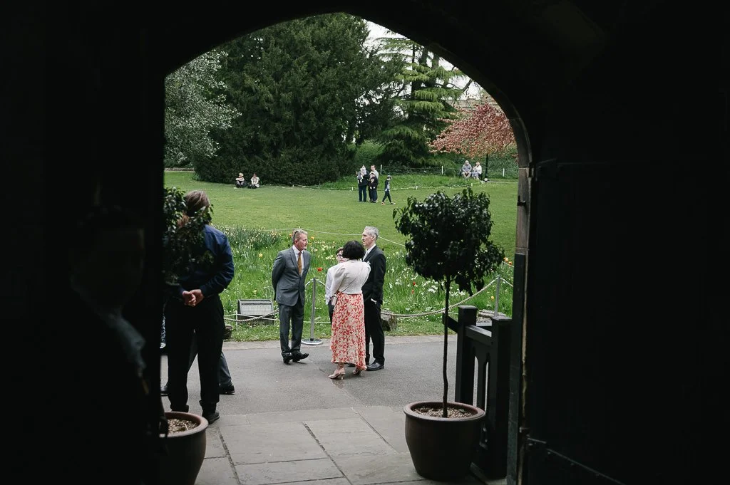 Bride To be Leeds Wedding guests outside viewed through the doorway