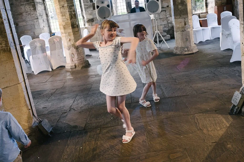 2027 Wedding Photographer guests dancing