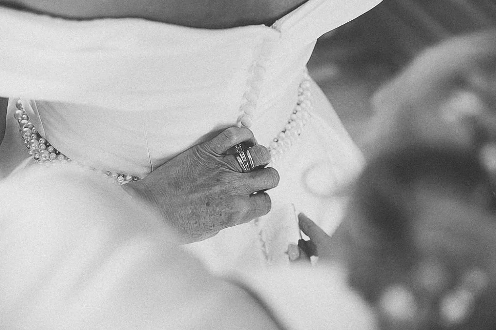 Fiddly buttons on the bride's dress