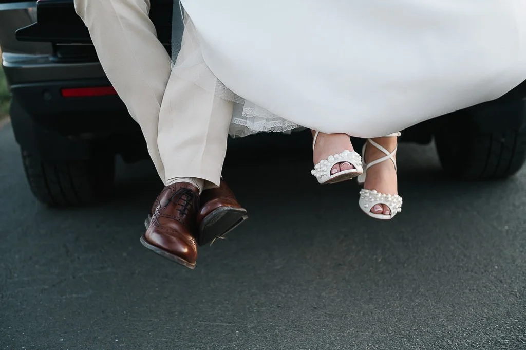 The Bride and groom hitch a ride back to the venue