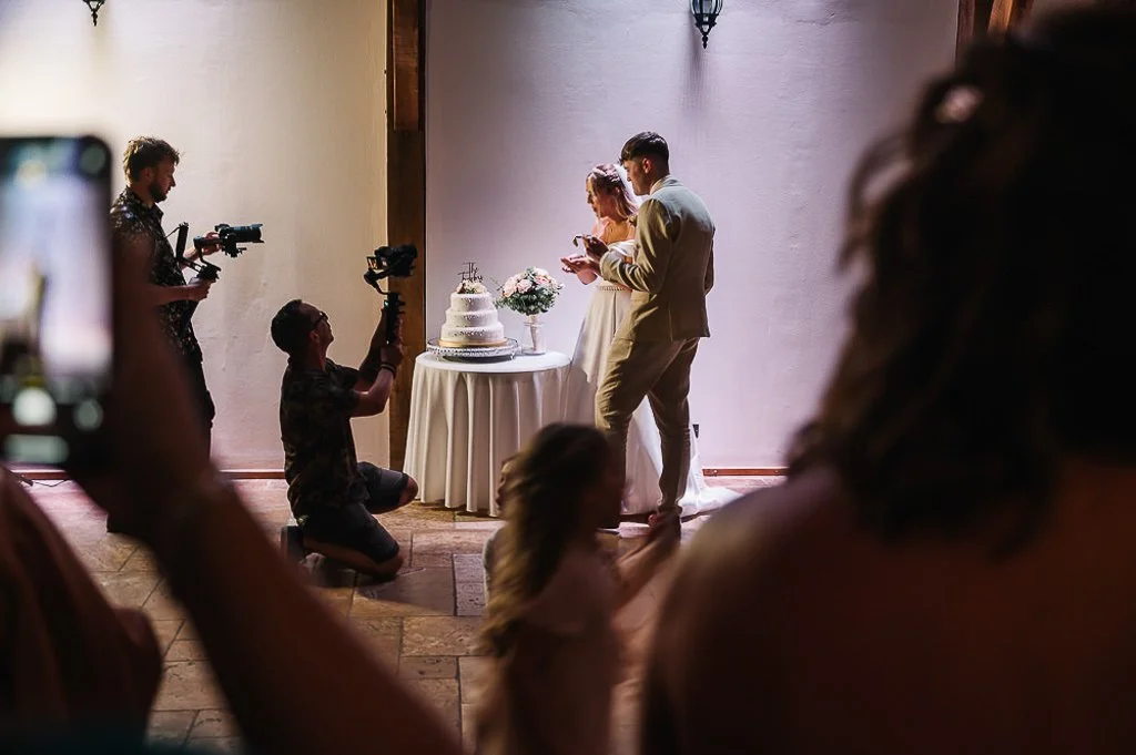 Cutting the cake again for the viddeographer