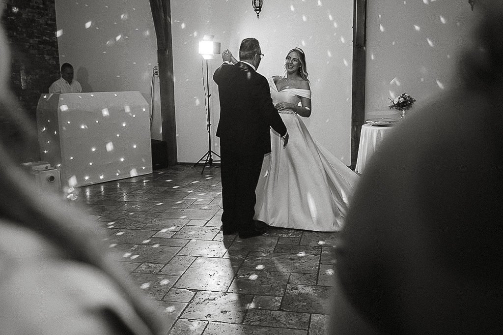 Bride dancing with her dad