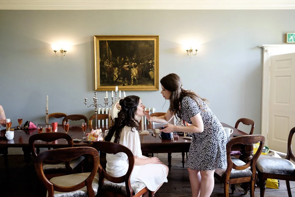 Bride getting her makeup done
