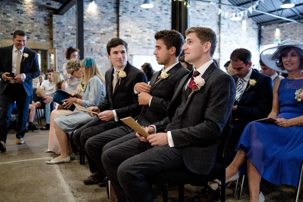 Josh the groom waiting patiently with his best men
