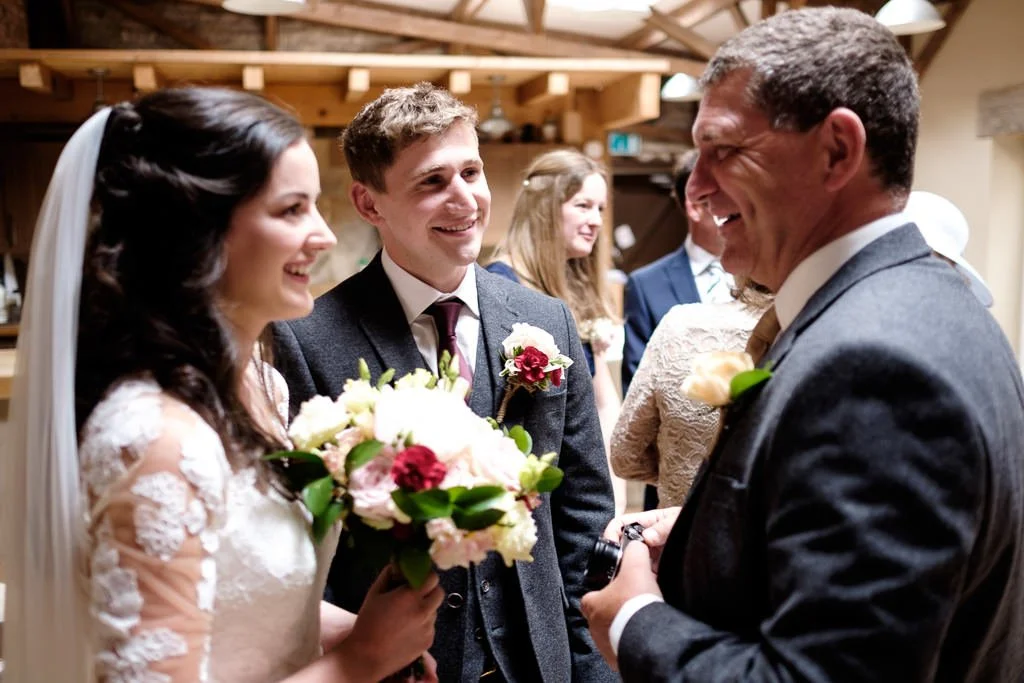 Talking with guests after the ceremony
