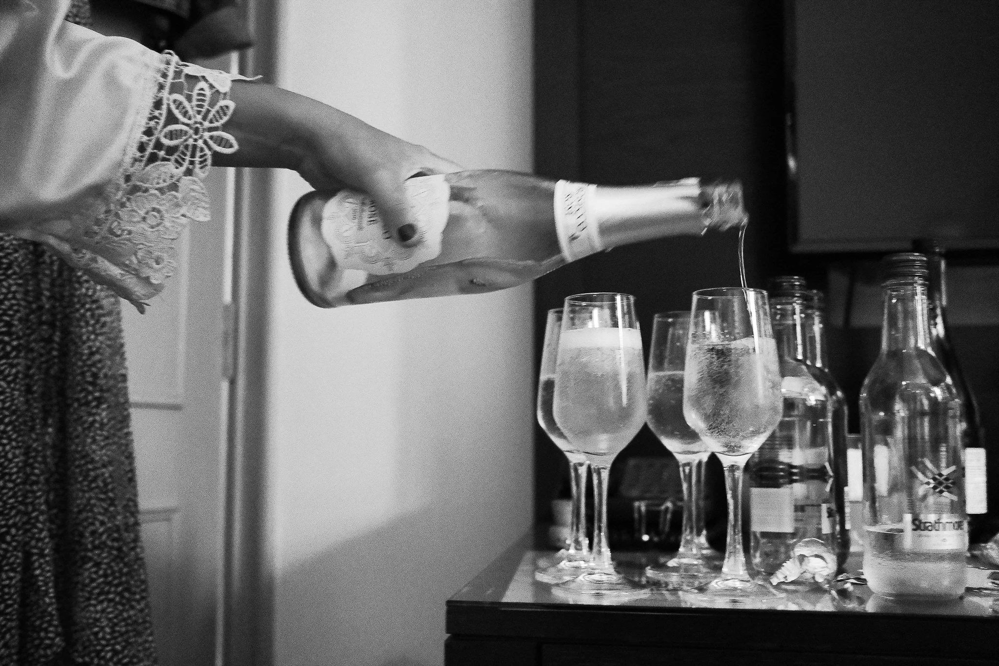 Pouring the breakfast Prosecco