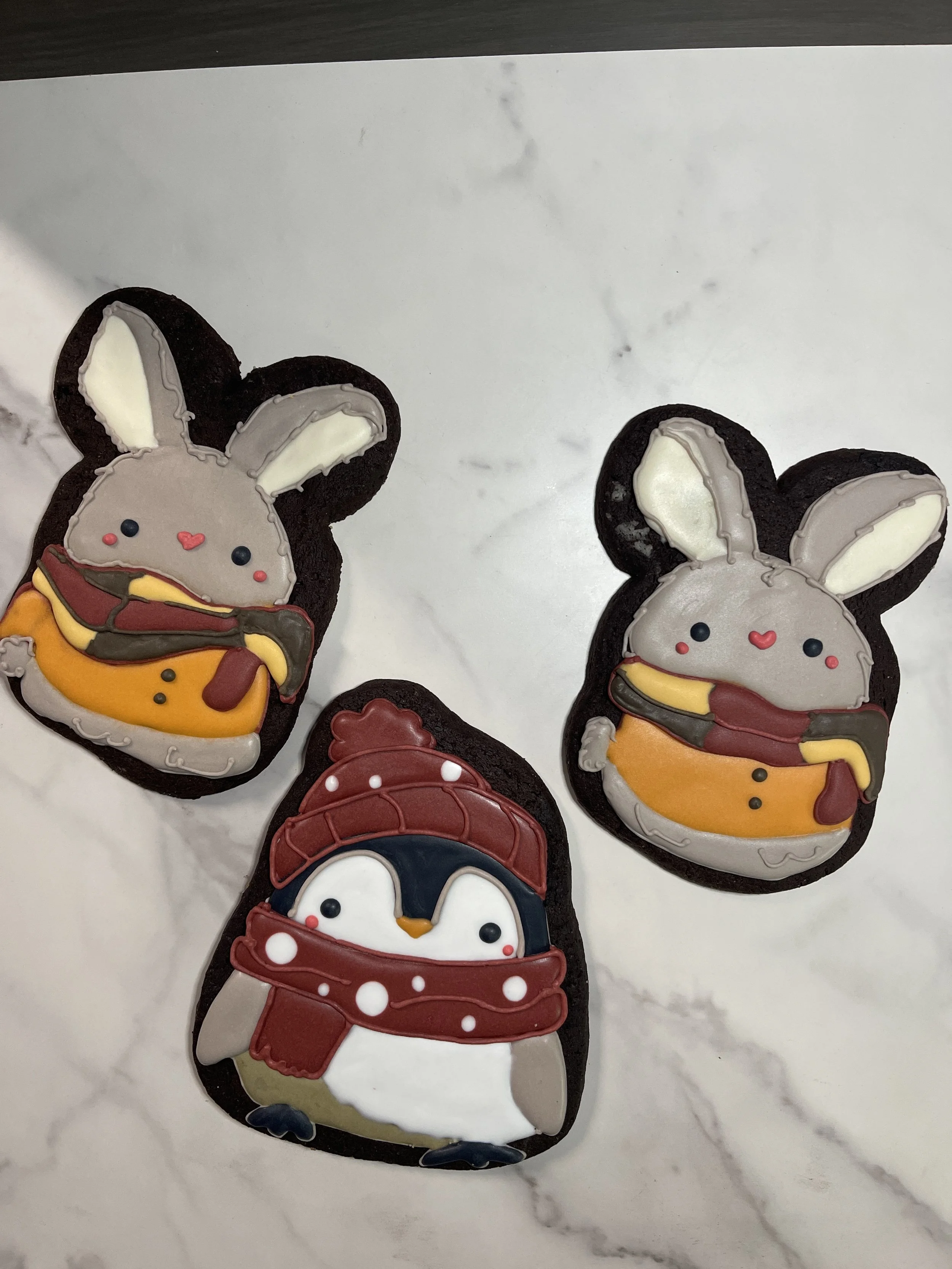 Bunny and penguin in scarf 