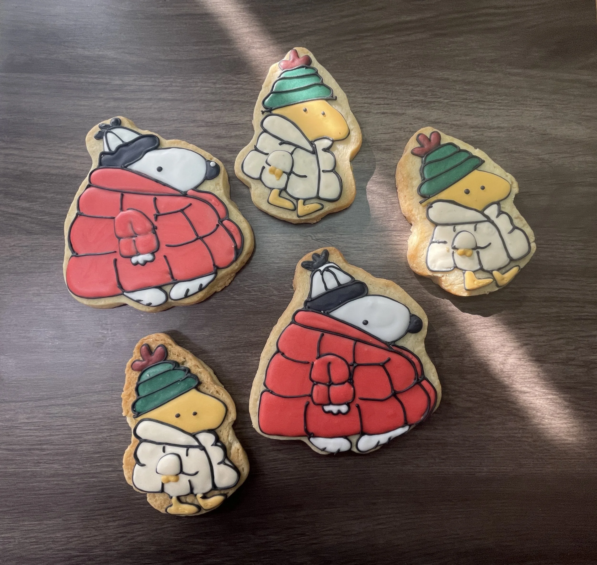 Beagle and bird friend in coats