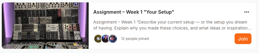 A collection of electronic music synthesizers and audio equipment on a wall-mounted rack.