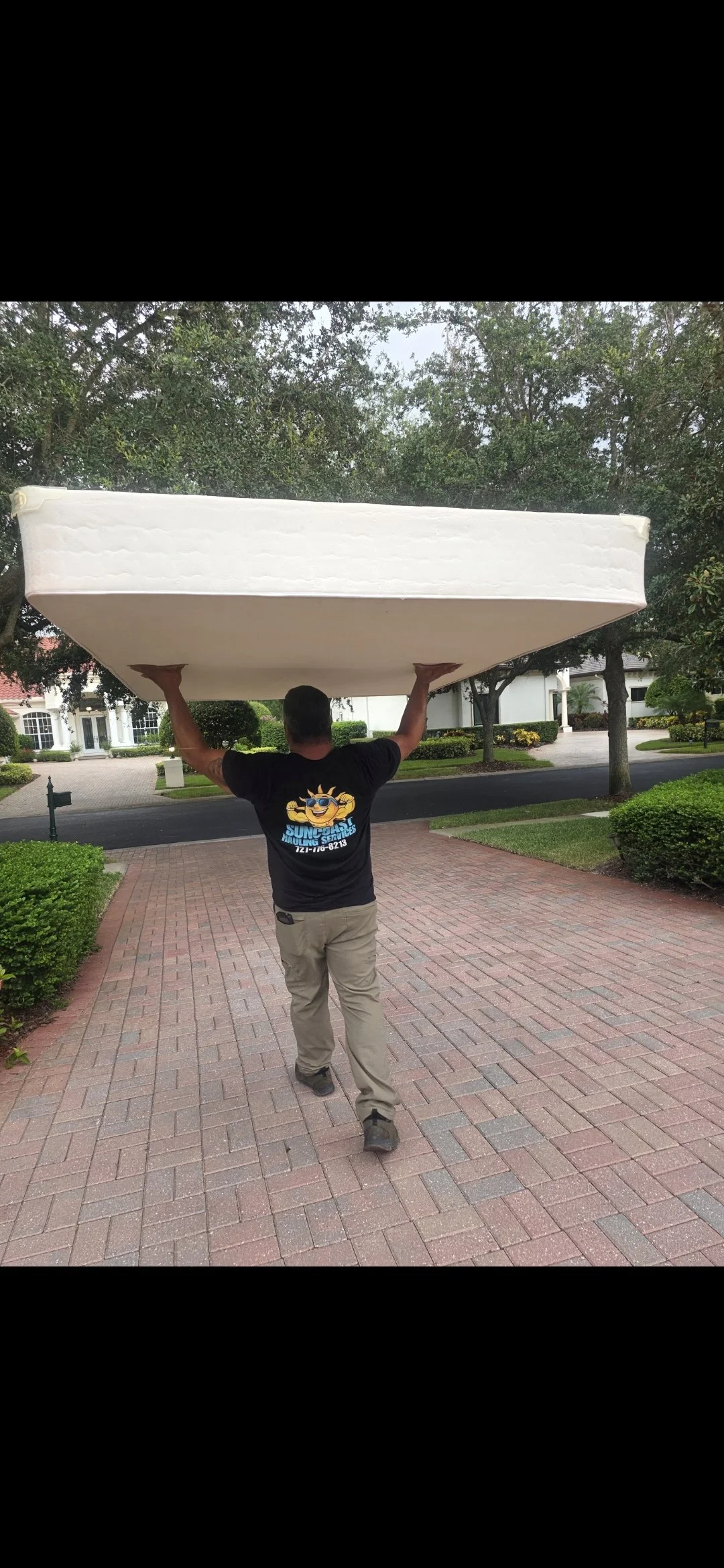hauling-services.jpg Suncoast Hauling Services removing an unwanted mattress