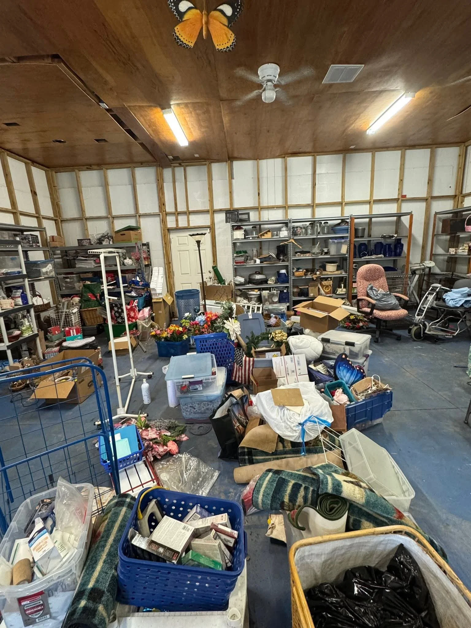 Suncoast Hauling Services clearing unwanted belongings from a residential property