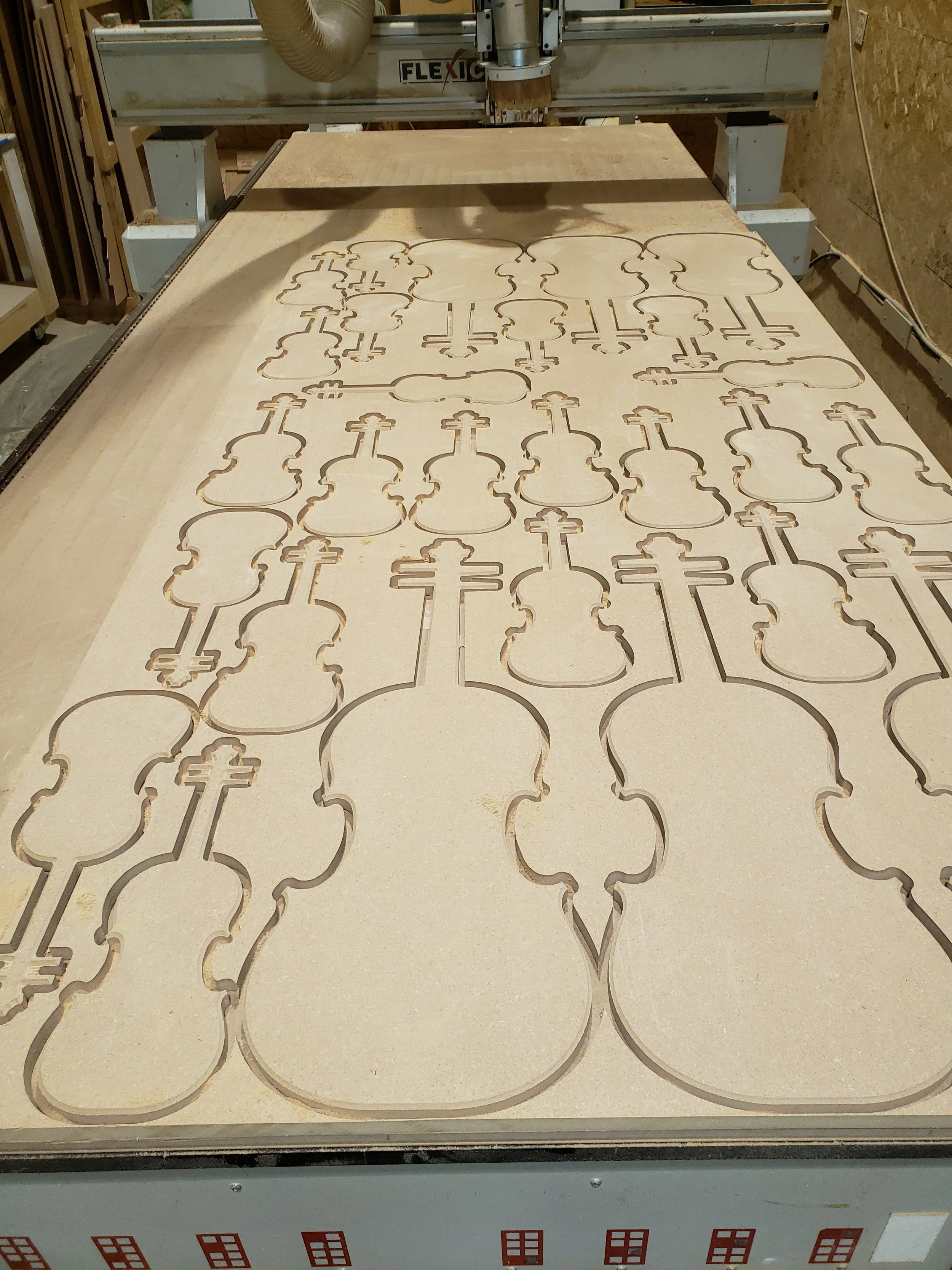 hewes-cnc-router-cut-violin-body-templates-mdf-sheet.jpg