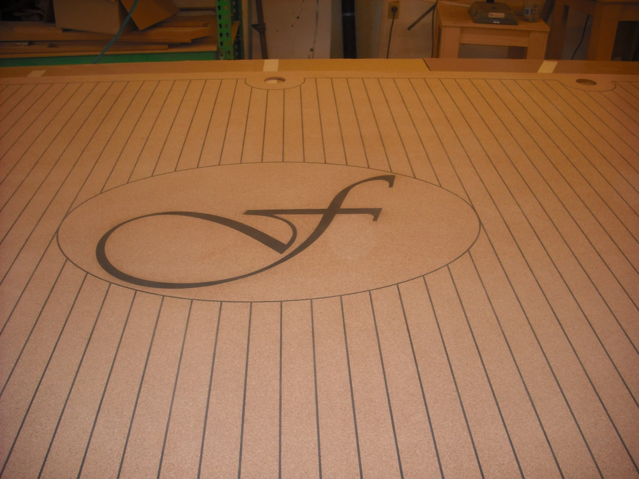 hewes-marine-deck-cnc-routed-custom-logo-medallion-synthetic-teak.jpg
