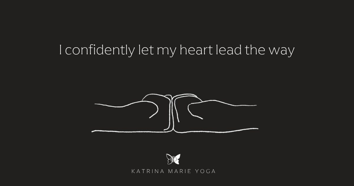 Greenish black background with a white hand drawn sketch of Brahma Mudra, white text reading I confidently let my heart lead the way, with the Katrina Marie Yoga logo.