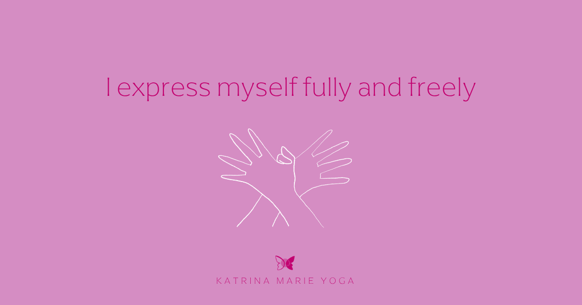 A light orchid-pink background with a white hand-drawn sketch of hands in Garuda Mudra, magenta text reading "I express myself fully and freely," and the Katrina Marie Yoga butterfly submark below.