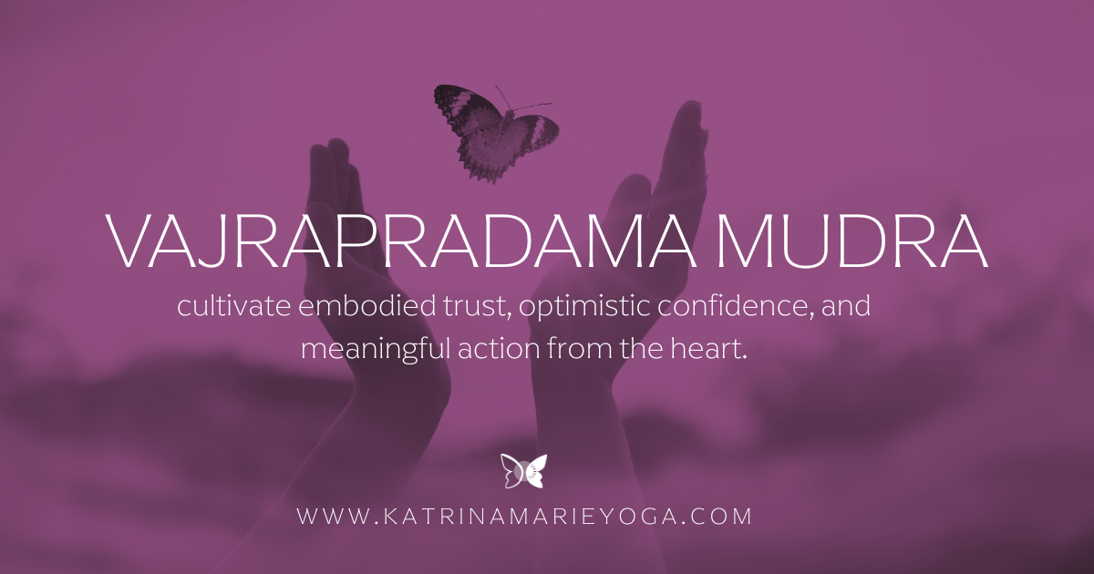 Hands lifted upward beneath a butterfly on a soft purple-toned background with the text “Vajrapradama Mudra — cultivate embodied trust, optimistic confidence, and meaningful action from the heart” and Katrina Marie Yoga branding.