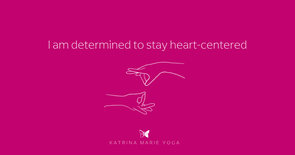 Magenta background with a white hand drawn sketch of Pingala Mudra, white text reading I am determined to stay heart-centered, and the Katrina Marie Yoga logo.