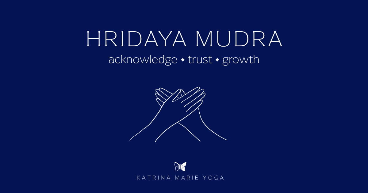 Navy keyword graphic with white text reading HRIDAYA MUDRA and the keywords acknowledge, trust, and growth. A white hand-drawn Hridaya Mudra sketch is centered below with the Katrina Marie Yoga logo.