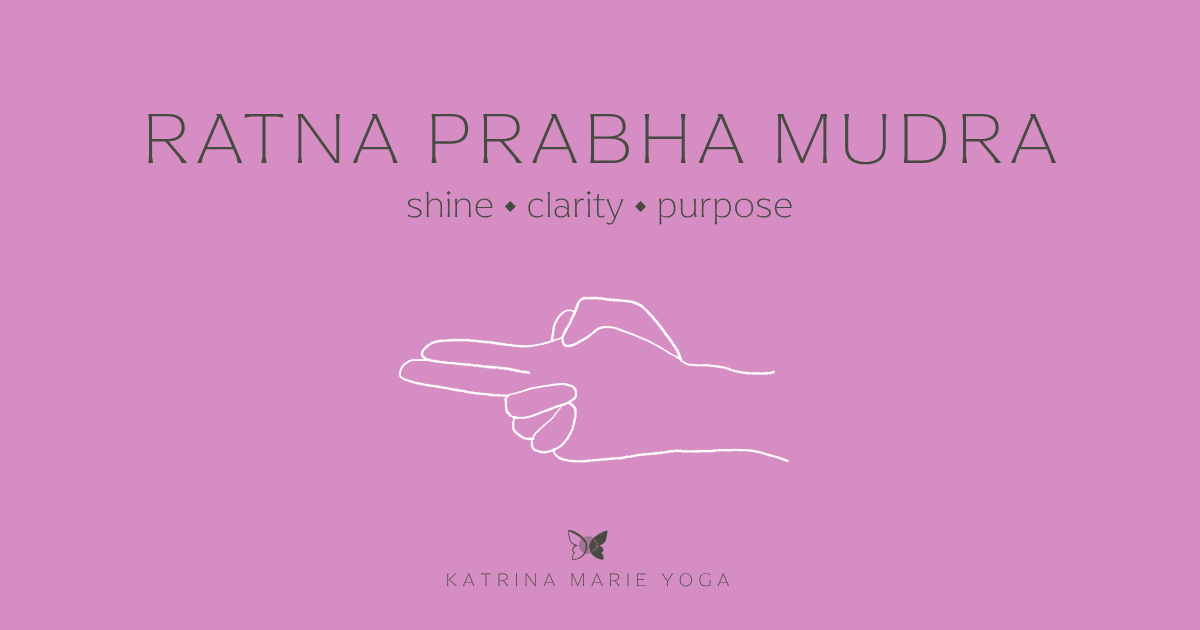 Bubblegum background, earthy green text reading RATNA PRABHA MUDRA with keywords shine, clarity, purpose, white hand drawn sketch of Ratna Prabha Mudra, Katrina Marie Yoga logo.