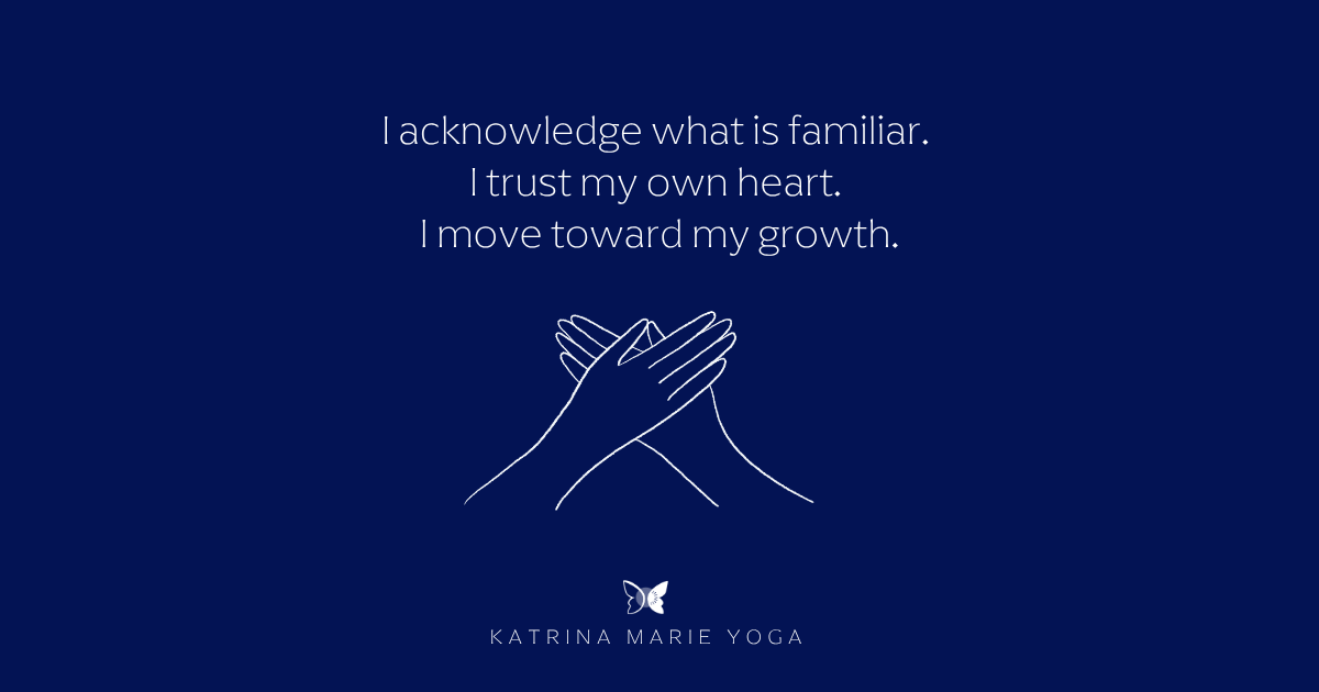Navy background with white text reading I acknowledge what is familiar, I trust my own heart, I move toward my growth, a white hand-drawn Hridaya Mudra sketch, and the Katrina Marie Yoga logo.