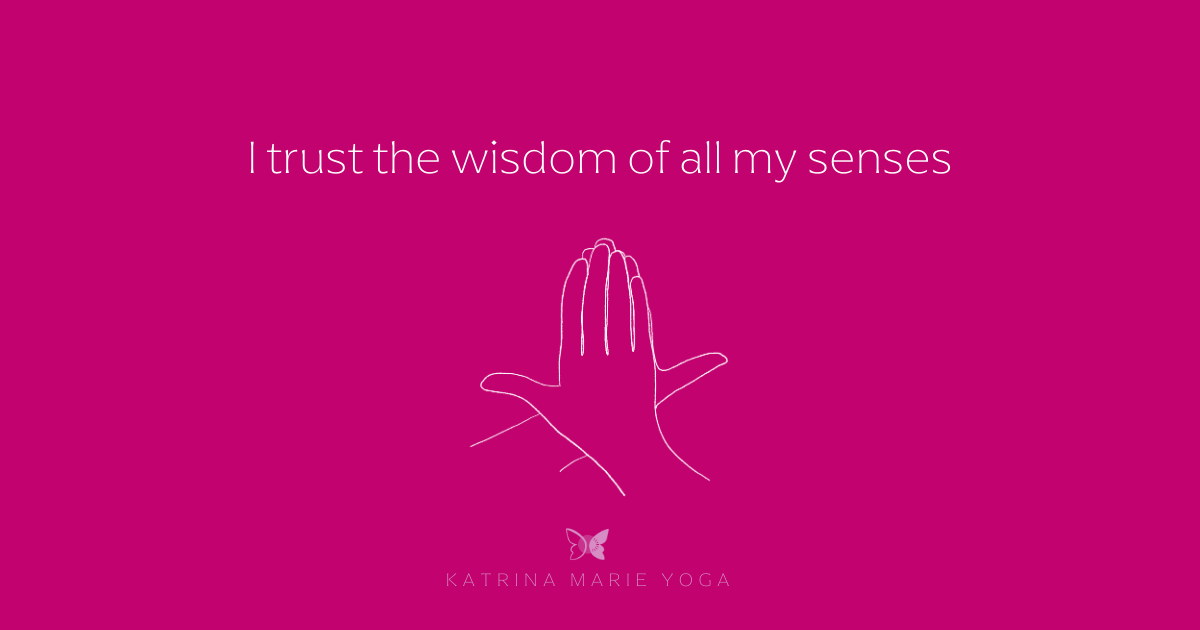 Pink background with Matsya Mudra hand illustration and text reading “I trust the wisdom of all my senses” with Katrina Marie Yoga logo below.