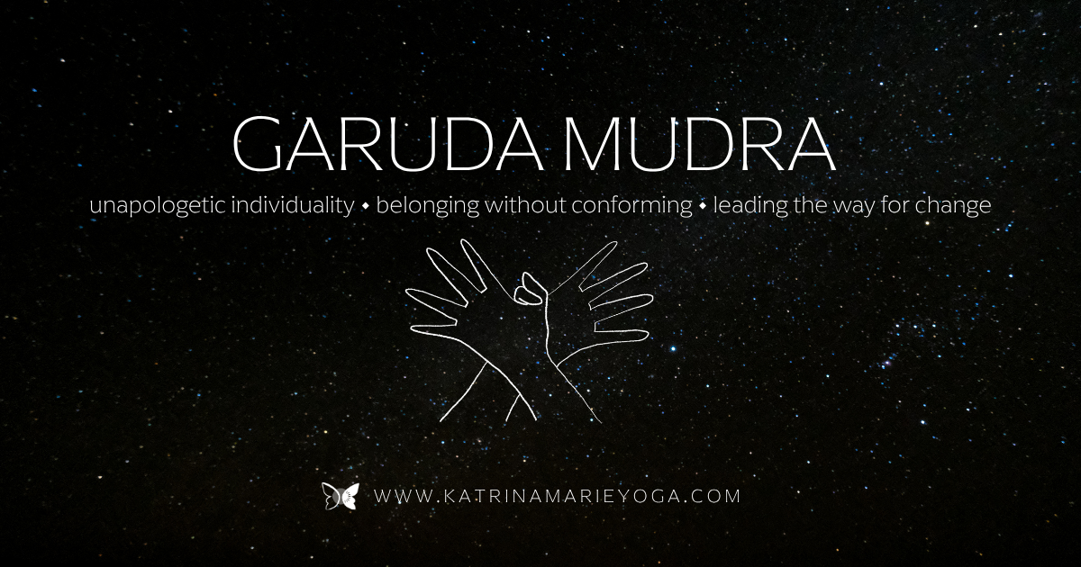 Starry night sky background with a white line drawing of hands in Garuda Mudra, white text reading "Garuda Mudra — unapologetic individuality • belonging without conforming • leading the way for change" — katrinamarieyoga.com