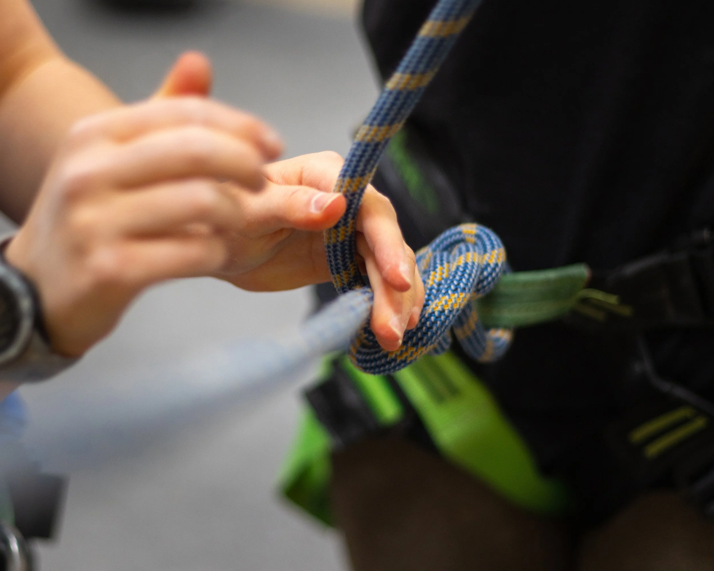 tying a rope at tide climbing centre cornwall