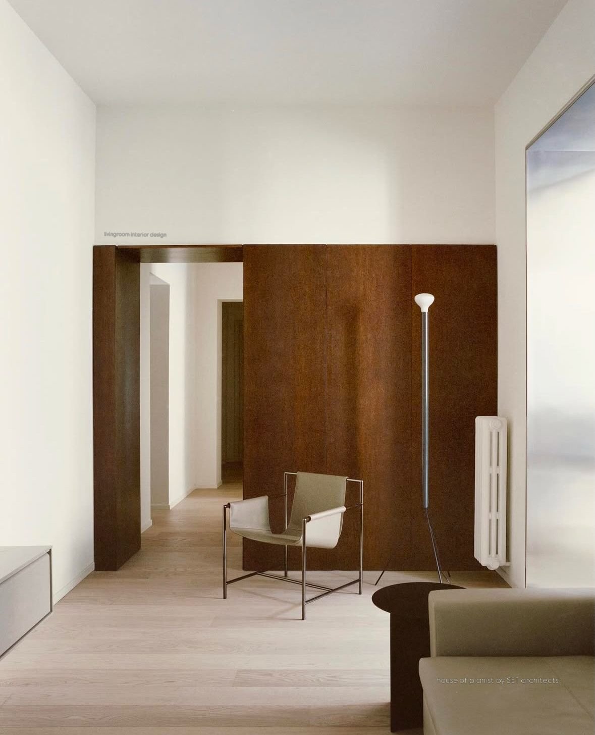 Studying reference today for a living room renovation. House for a pianist by set architects - a 19th century shell tuned with a new rhythm. 

Dark walnut joinery becomes the backbone set against light oak floors and white walls, to create a calm spa